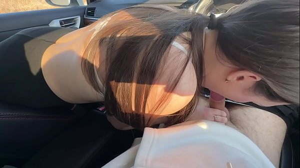 Girl friend fucked in the mouth of a car in a public parking lot
