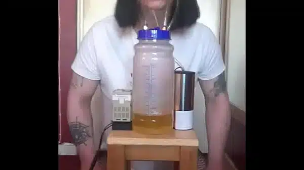 bisexual crossdresser with his portable cow milking machine part 4