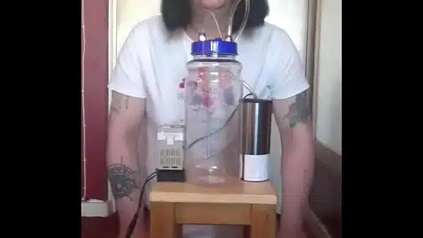 bisexual crossdresser with his portable cow milking machine part 5 with the 10 voting down wankers